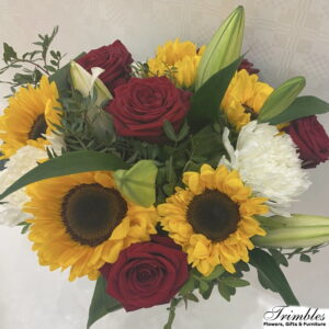 Vibrant 'Golden Sunshine' bouquet with sunflowers, red roses, and white chrysanthemums.
