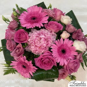 Vibrant 'Candy Surprise' bouquet with pink gerbera daisies, pink and white roses.